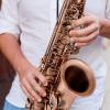 imageAlto Saxophone E Flat Brass Sax Kit Professional Sound Complete Accessories Ideal for All Players Includes Hard Case 10 Extra Reeds Strap Gloves Cleaning Kit ampamp More Gold Lacquer FinishAntique Red
